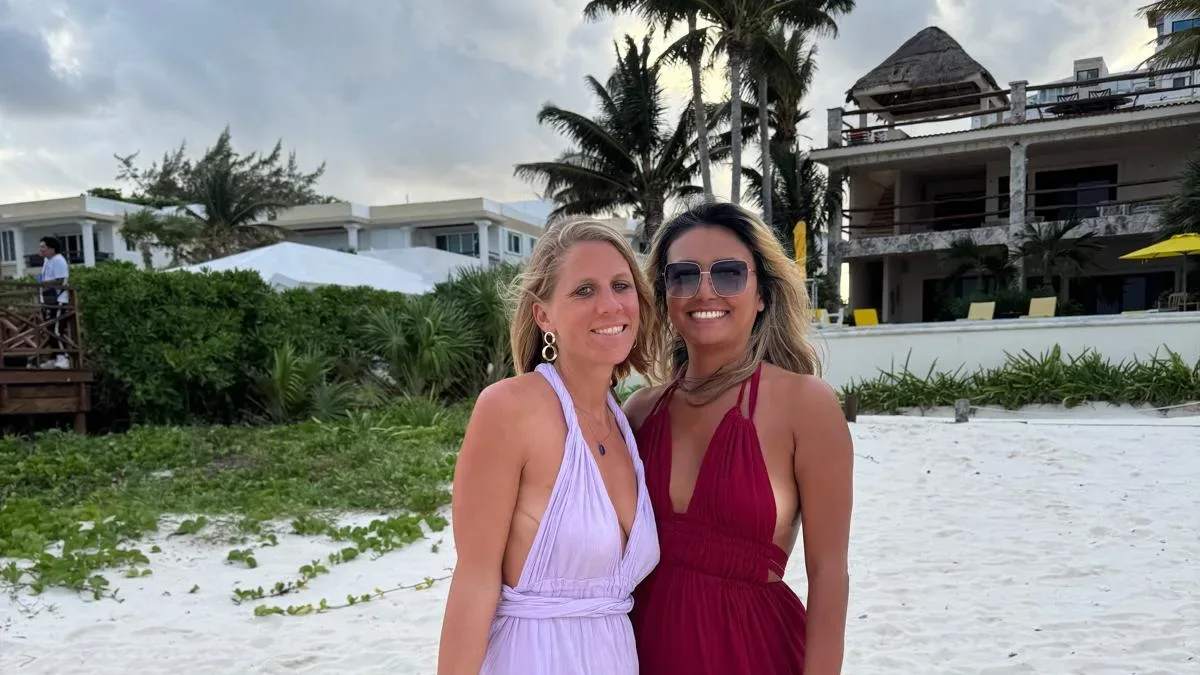 Alexandra and Karina, co-founders of RECLAIM, barefoot on the beach in Puerto Morelos, 2026