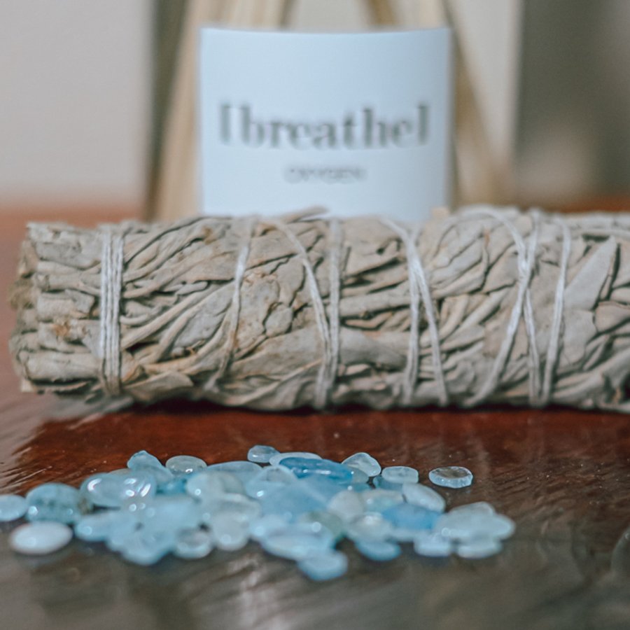 Sage and crystals laid out for a ceremony