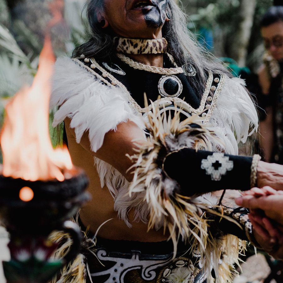 A Mayan elder leading a fire ceremony