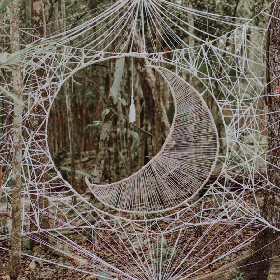 A moon dreamcatcher in a sacred ceremony space
