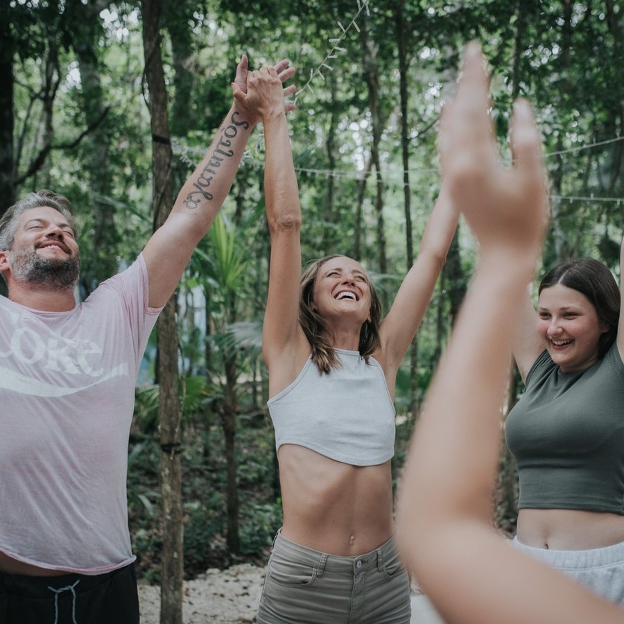 Retreat guests in joyful celebration